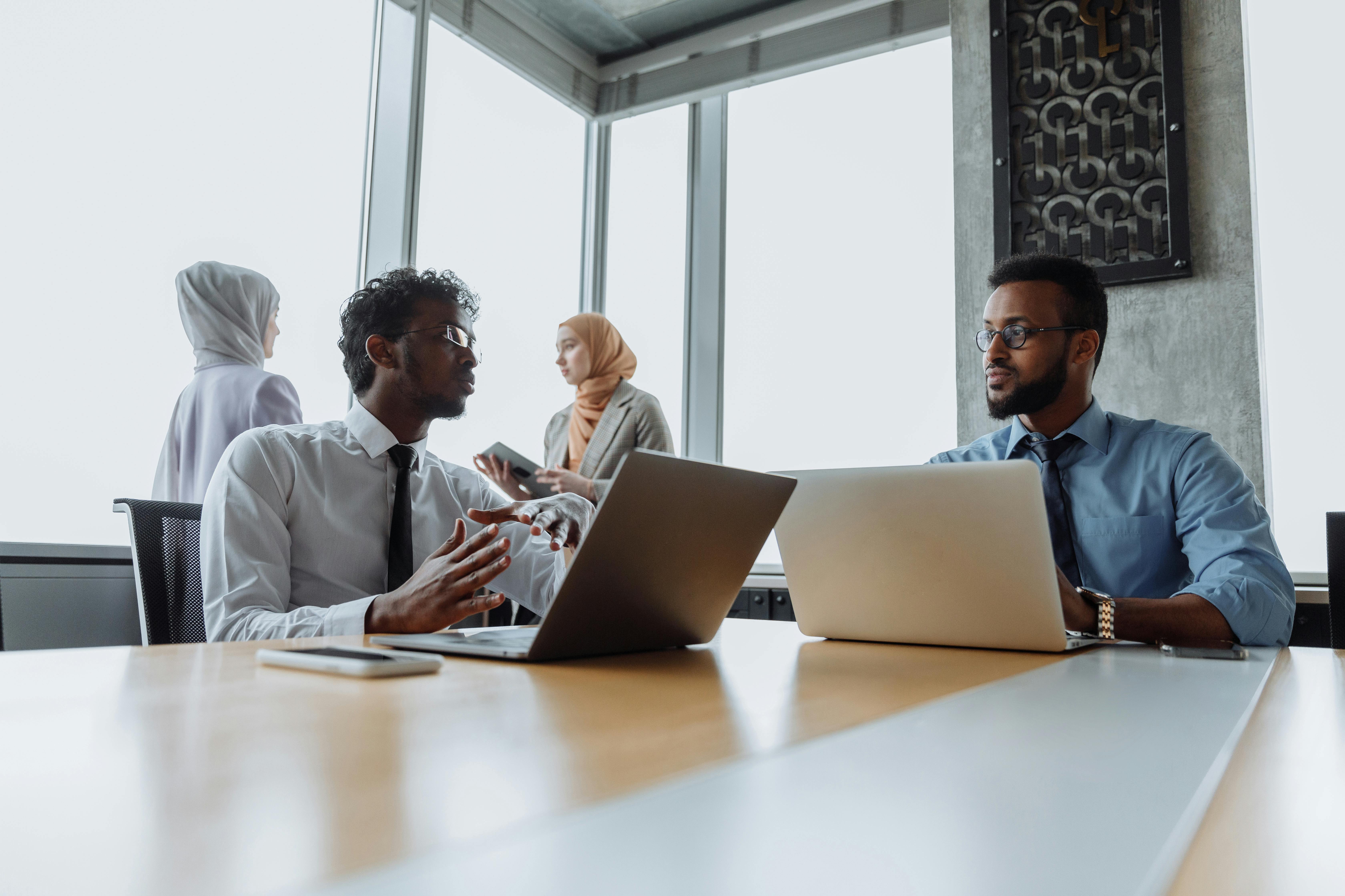 Business professionals connecting through strategic networking